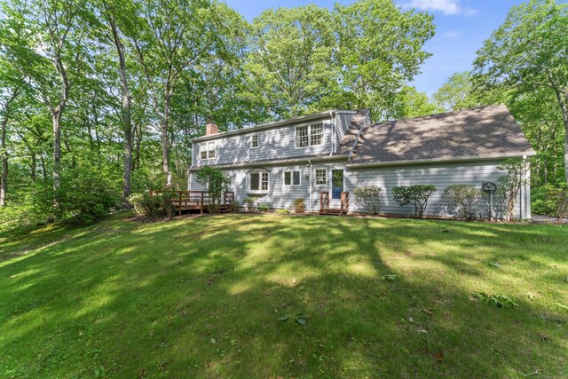 6 Middlebrook Pond Rd, Redding, CT 06896 - view of front facade featuring a chimney, a front lawn, and a wooden deck