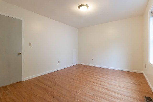 146 Macarthur Dr Unit 2B, Waterbury, CT 06704 - unfurnished room with light wood-style floors and baseboards