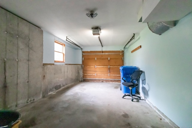 146 Macarthur Dr Unit 2B, Waterbury, CT 06704 - garage featuring a garage door opener