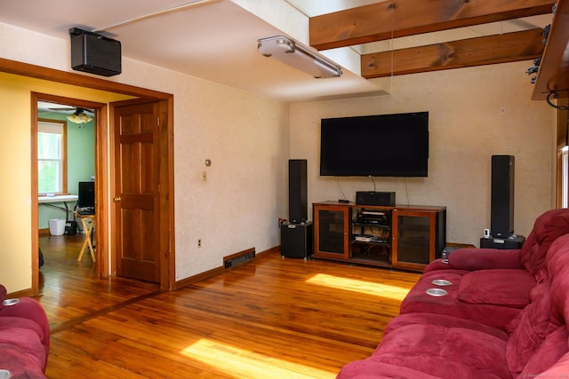 138 Baltic Hanover Rd, Sprague, CT 06330 - living area featuring wood finished floors, a ceiling fan, and baseboards
