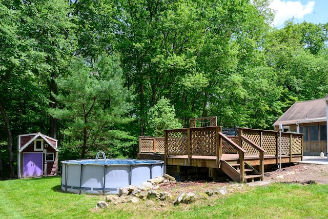 138 Baltic Hanover Rd, Sprague, CT 06330 - view of grassy yard with a wooden deck and an outdoor pool