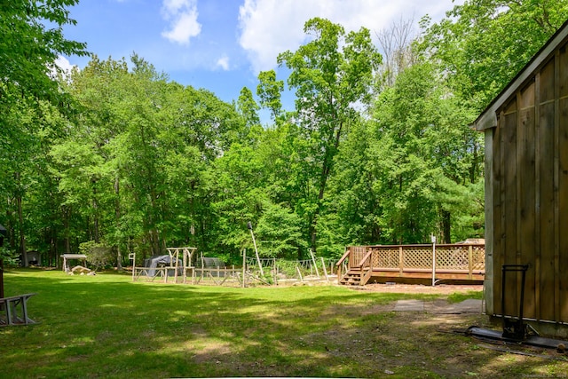 138 Baltic Hanover Rd, Sprague, CT 06330 - view of grassy yard with a wooden deck and a playground