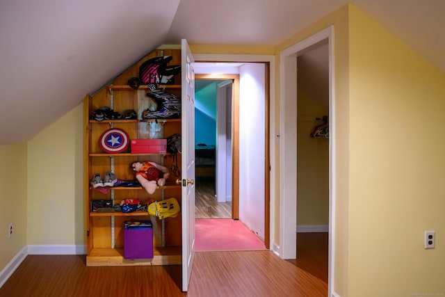 138 Baltic Hanover Rd, Sprague, CT 06330 - corridor with wood finished floors, lofted ceiling, and baseboards