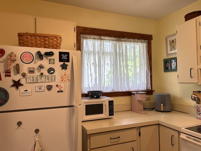 6 Deer Hill Ct Unit 6, Woodbury, CT 06798 - kitchen with white appliances, light countertops, and white cabinets