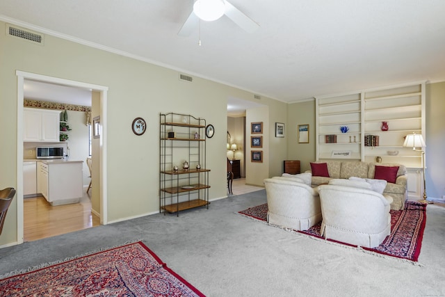 78 Heritage Vlg Unit A, Southbury, CT 06488 - living room with light carpet, crown molding, ceiling fan, and baseboards