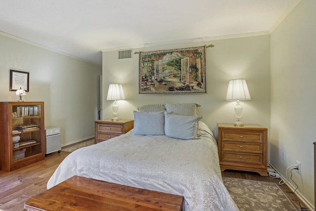 78 Heritage Vlg Unit A, Southbury, CT 06488 - bedroom with crown molding, wood finished floors, and baseboards