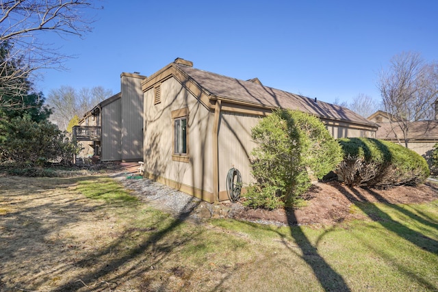 78 Heritage Vlg Unit A, Southbury, CT 06488 - view of side of property with a yard and a chimney