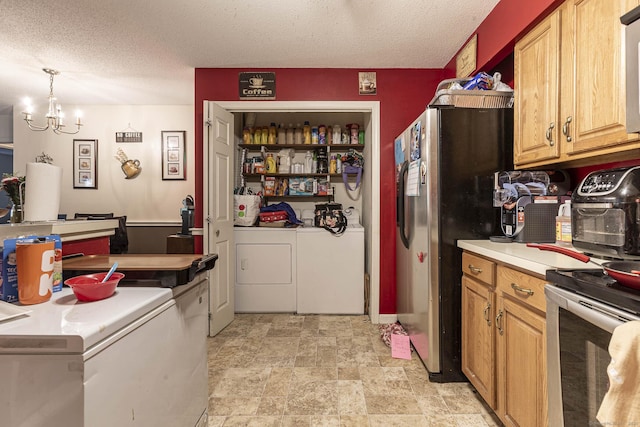 108 Ashmead Commons Unit 108, Enfield, CT 06082 - kitchen featuring stainless steel appliances, light countertops, independent washer and dryer, a chandelier, and a textured ceiling