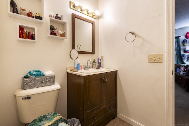 108 Ashmead Commons Unit 108, Enfield, CT 06082 - bathroom with vanity, toilet, tile patterned flooring, and baseboards