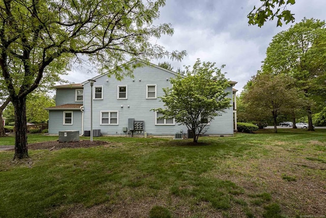 108 Ashmead Commons Unit 108, Enfield, CT 06082 - back of house with a yard and central AC unit