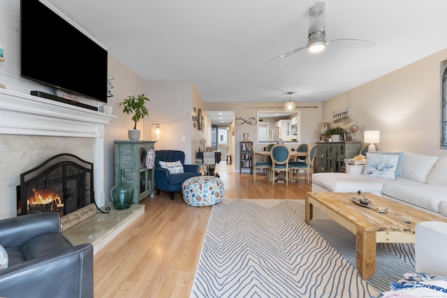 1 Mansfield Grove Rd Apt 205, East Haven, CT 06512 - living area featuring wood finished floors, ceiling fan, and a high end fireplace