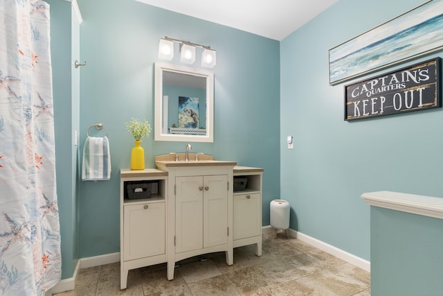 1 Mansfield Grove Rd Apt 205, East Haven, CT 06512 - bathroom featuring vanity, baseboards, and a shower with shower curtain
