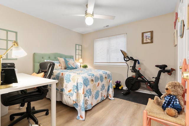1 Mansfield Grove Rd Apt 205, East Haven, CT 06512 - bedroom with wood finished floors, an office area, and a ceiling fan