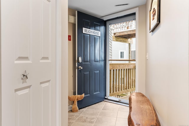 1 Mansfield Grove Rd Apt 205, East Haven, CT 06512 - foyer entrance featuring light tile patterned floors and baseboards