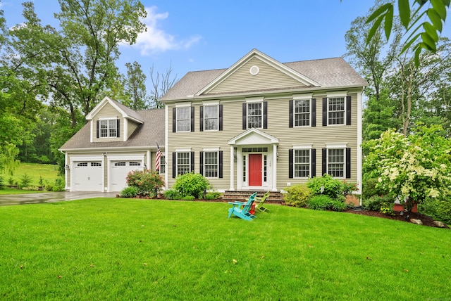 148 Bellridge Rd, Glastonbury, CT 06033 - colonial house with driveway, a front lawn, a shingled roof, and a garage