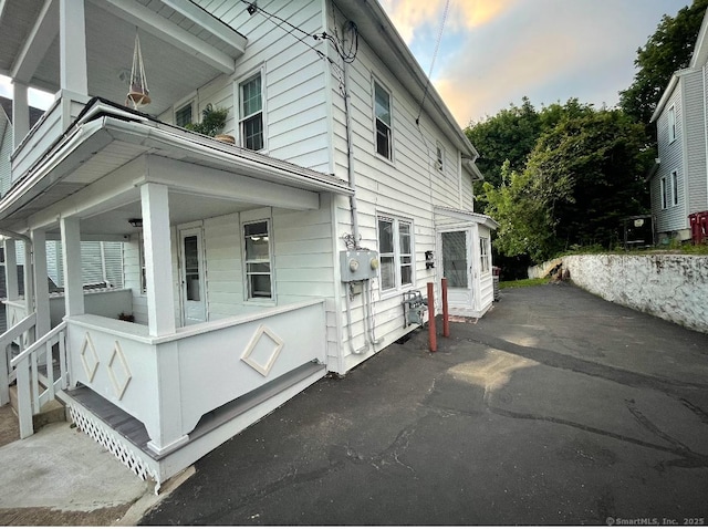 198 Maple St, Naugatuck, CT 06770 - property exterior at dusk featuring a porch