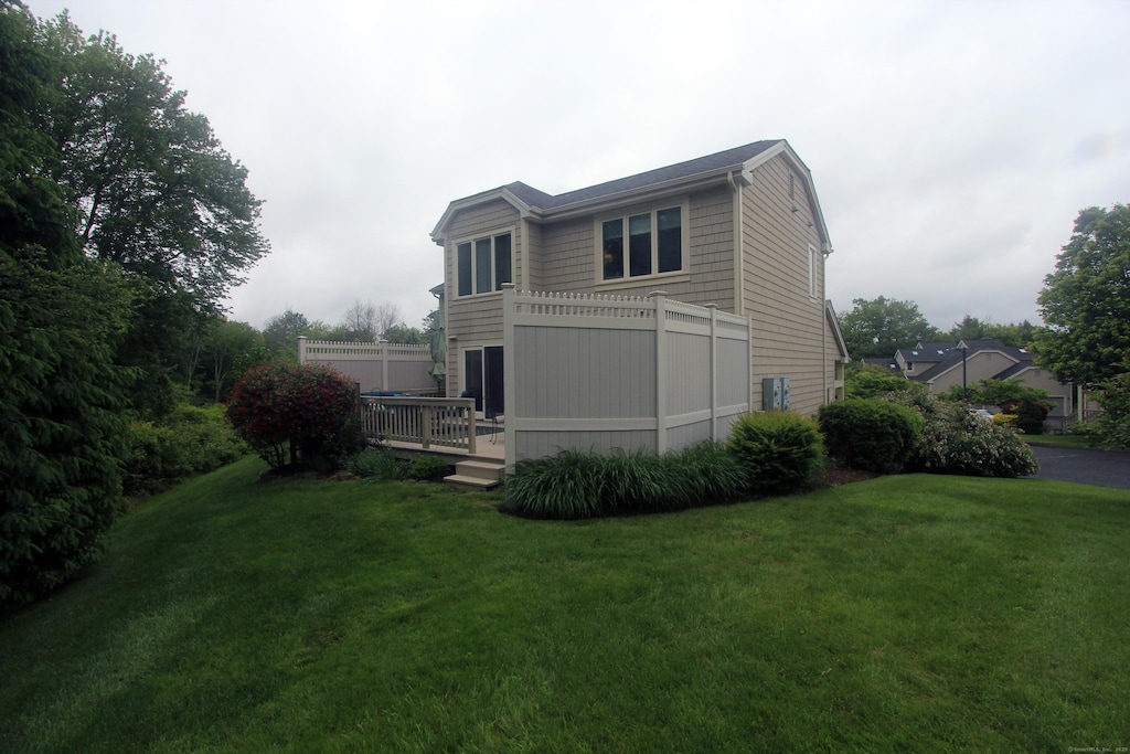 12 Boulevard Dr Unit 35-186, Danbury, CT 06810 - rear view of property featuring a yard and a deck