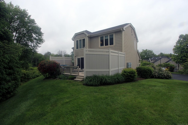 12 Boulevard Dr Unit 35-186, Danbury, CT 06810 - rear view of property featuring a yard and a deck