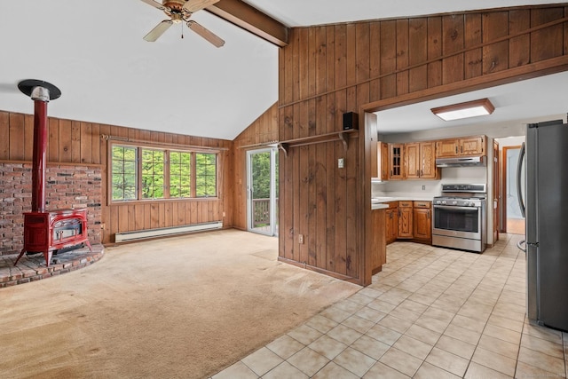 10 Richmond Rd, West Hartford, CT 06117 - kitchen featuring appliances with stainless steel finishes, baseboard heating, under cabinet range hood, wood walls, and brown cabinets