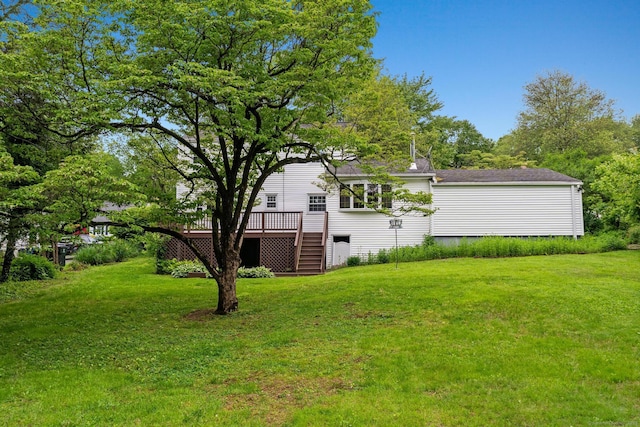 10 Richmond Rd, West Hartford, CT 06117 - view of green lawn with a deck and stairway
