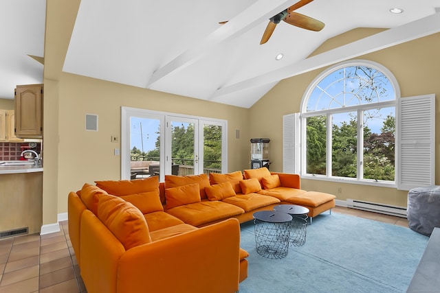 440 Hilltop Rd, Bridgeport, CT 06605 - living area with a baseboard radiator, healthy amount of natural light, light tile patterned floors, a ceiling fan, and high vaulted ceiling
