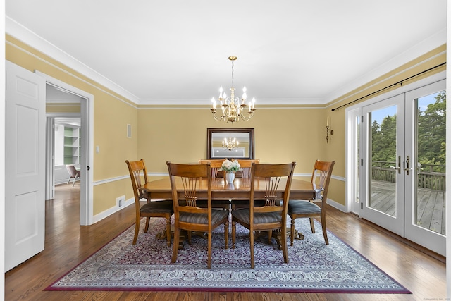 440 Hilltop Rd, Bridgeport, CT 06605 - dining room with a chandelier, baseboards, french doors, wood finished floors, and crown molding