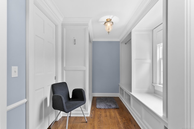 440 Hilltop Rd, Bridgeport, CT 06605 - sitting room with dark wood finished floors, crown molding, and baseboards