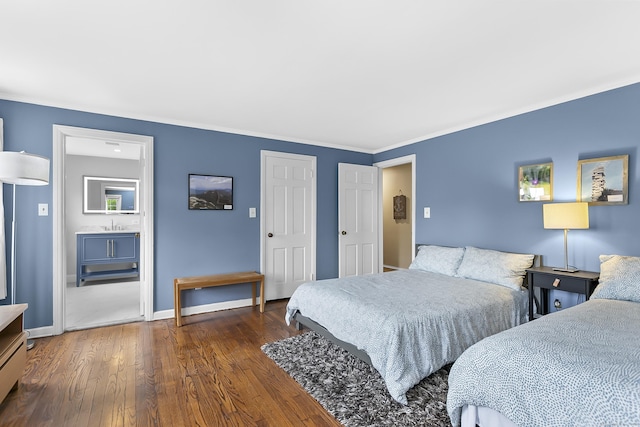440 Hilltop Rd, Bridgeport, CT 06605 - bedroom featuring wood finished floors, ornamental molding, baseboards, and ensuite bathroom