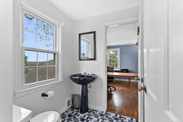 440 Hilltop Rd, Bridgeport, CT 06605 - half bathroom with toilet and baseboards