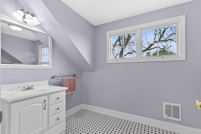 440 Hilltop Rd, Bridgeport, CT 06605 - bathroom with healthy amount of natural light, baseboards, and vanity