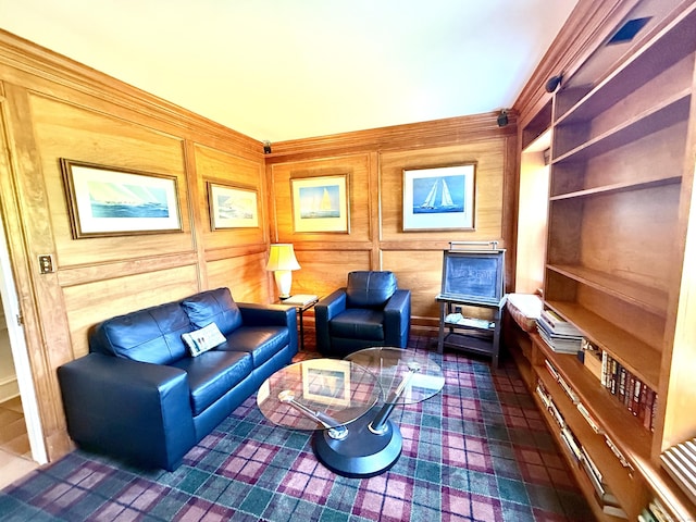 440 Hilltop Rd, Bridgeport, CT 06605 - living area featuring built in shelves and wooden walls