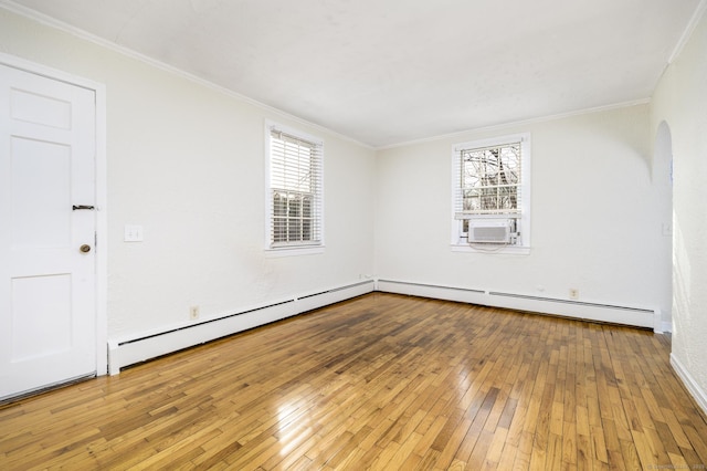 12 Wistar Ct, Darien, CT 06820 - spare room with hardwood / wood-style flooring, ornamental molding, a baseboard radiator, cooling unit, and baseboards