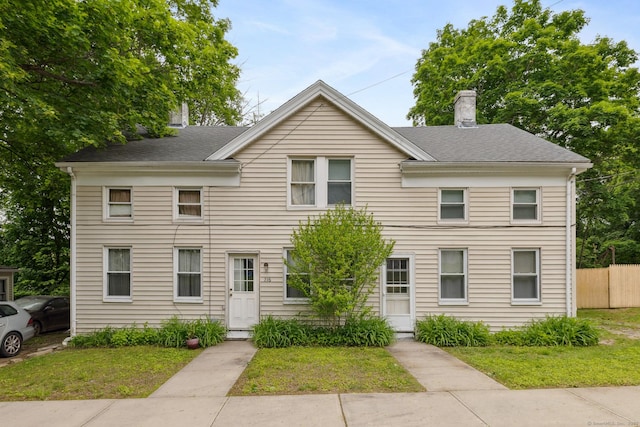 216 High St, Sprague, CT 06330 - townhome / multi-family property with a chimney and roof with shingles