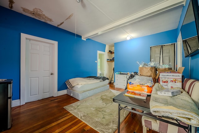 88 Boston Post Rd, Milford, CT 06460 - bedroom with wood finished floors, beamed ceiling, and baseboards