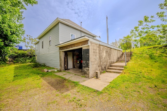 88 Boston Post Rd, Milford, CT 06460 - view of side of home featuring stairway