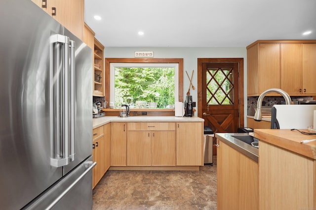 11 College Hill Rd, North Canaan, CT 06018 - kitchen with freestanding refrigerator, light brown cabinets, plenty of natural light, light countertops, and recessed lighting