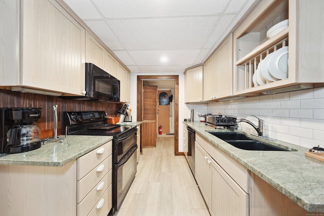 11 College Hill Rd, North Canaan, CT 06018 - kitchen featuring black appliances, backsplash, light wood finished floors, a drop ceiling, and light stone countertops