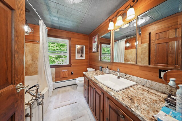 11 College Hill Rd, North Canaan, CT 06018 - bathroom featuring baseboard heating, vanity, wooden walls, shower / tub combo, and tile patterned flooring