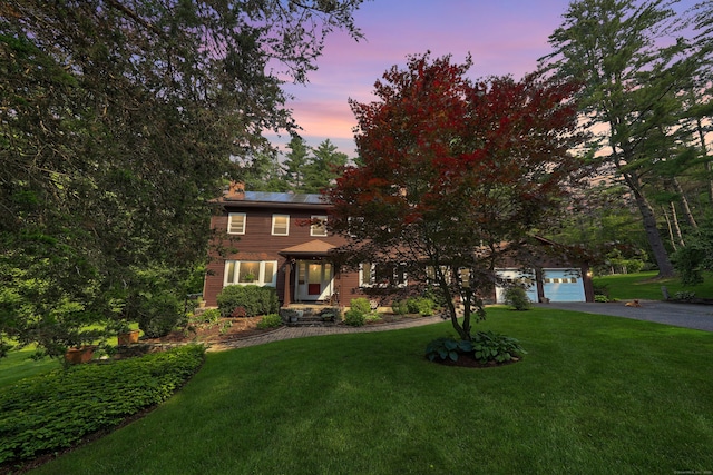 11 College Hill Rd, North Canaan, CT 06018 - view of property hidden behind natural elements featuring asphalt driveway, a lawn, and a chimney