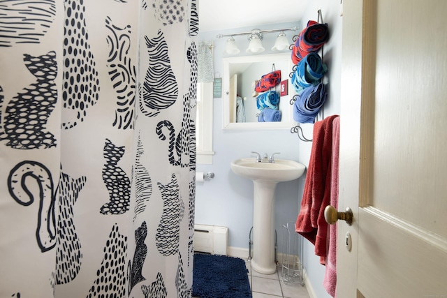 7 Lawrence Ave, North Canaan, CT 06018 - bathroom featuring tile patterned flooring, a sink, and a baseboard heating unit