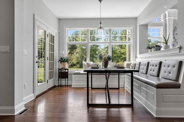562 Upper Grassy Hill Rd, Woodbury, CT 06798 - dining space featuring dark wood-style flooring, baseboards, and ornate columns