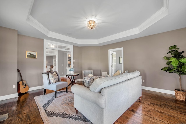 562 Upper Grassy Hill Rd, Woodbury, CT 06798 - living room with a tray ceiling, wood finished floors, crown molding, baseboards, and french doors