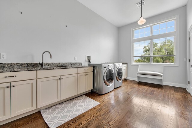 562 Upper Grassy Hill Rd, Woodbury, CT 06798 - laundry room with washer and dryer, cabinet space, dark wood-type flooring, and baseboards