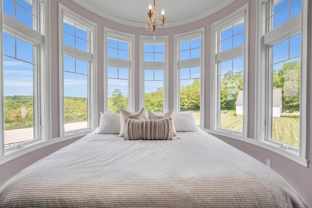 562 Upper Grassy Hill Rd, Woodbury, CT 06798 - bedroom with multiple windows, ornamental molding, a chandelier, and a towering ceiling
