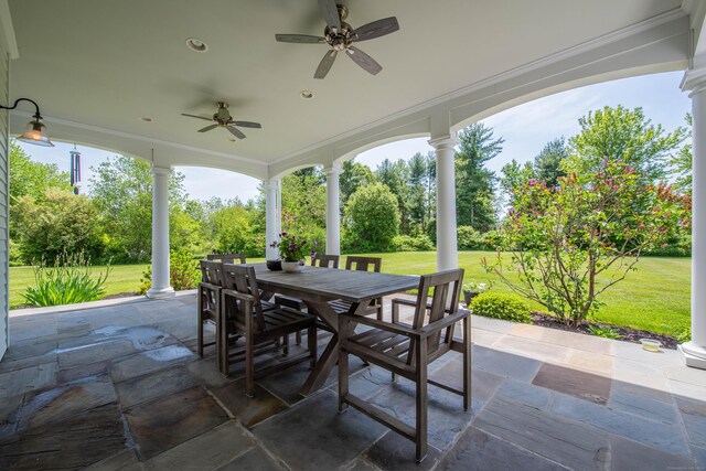 562 Upper Grassy Hill Rd, Woodbury, CT 06798 - view of patio featuring outdoor dining space, a ceiling fan, and view of wooded area