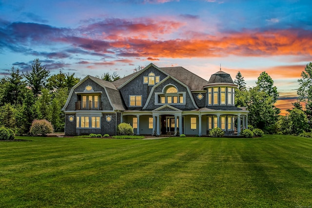 562 Upper Grassy Hill Rd, Woodbury, CT 06798 - back of property featuring a lawn, a gambrel roof, and covered porch