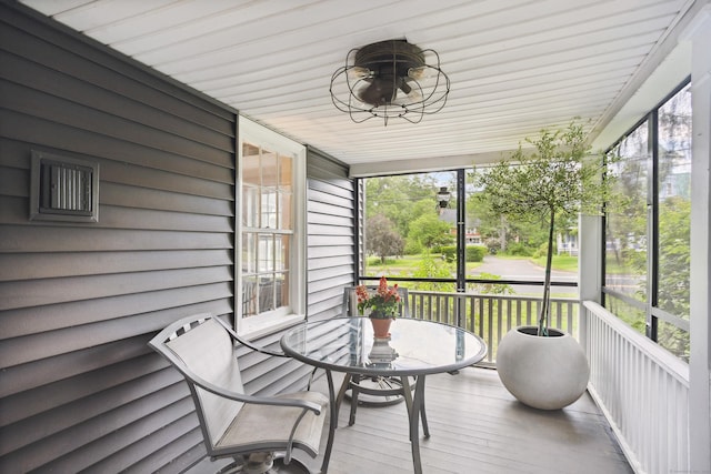291 Hopmeadow St, Simsbury, CT 06089 - sunroom with plenty of natural light and outdoor dining area