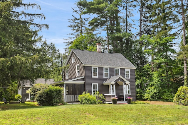 291 Hopmeadow St, Simsbury, CT 06089 - view of front of house with a chimney, a front lawn, a shingled roof, and a sunroom