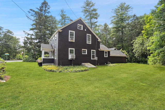 291 Hopmeadow St, Simsbury, CT 06089 - view of side of home with a lawn, a chimney, and cooling unit