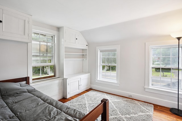 291 Hopmeadow St, Simsbury, CT 06089 - bedroom with light wood finished floors and lofted ceiling